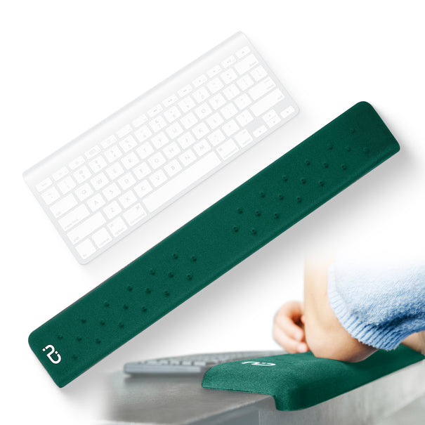 Green desk edge cushion wrist rest on a desk
